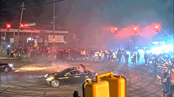 WATCH: Illegal street racing 'takeover' explodes as hundreds swarm streets and suspects bolt Education Gold Coast